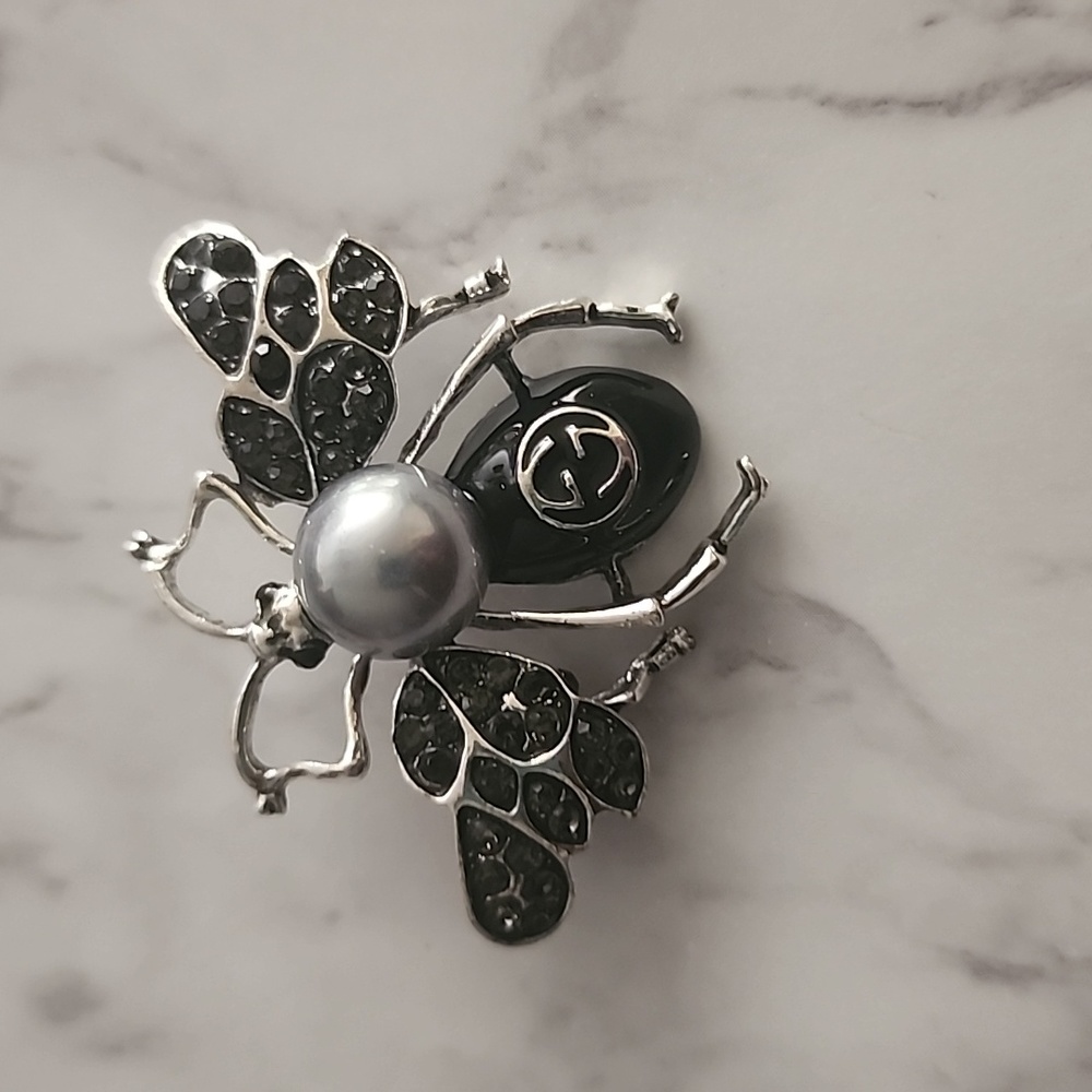 Bee brooch cute and simple new ..silver and black